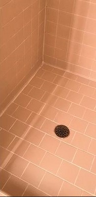 Shower tiles after cleaning, bright and spotless